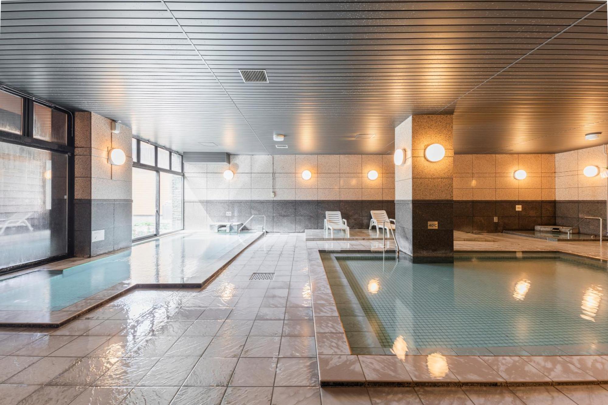 Higashikawa Asahidake Onsen Hotel Bear Monte מראה חיצוני תמונה